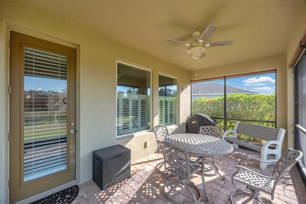 6230 Plover Meadow Street Lithia, FL 33547 - Photo 29 of 50 a living room with furniture and a large window