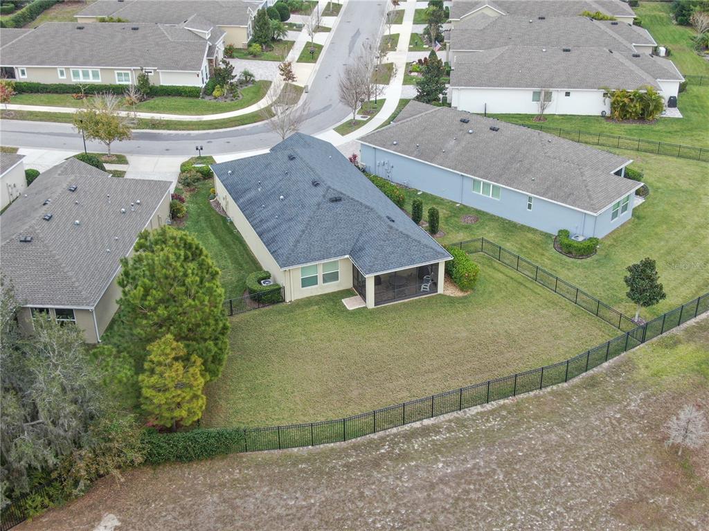 6230 Plover Meadow Street Lithia, FL 33547 - Photo 32 of 50 an aerial view of a house with a yard
