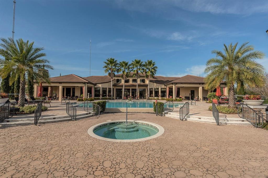 6230 Plover Meadow Street Lithia, FL 33547 - Photo 40 of 50 a view of a house with swimming pool and sitting area