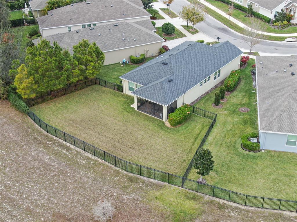 6230 Plover Meadow Street Lithia, FL 33547 - Photo 5 of 50 an aerial view of a house with a yard