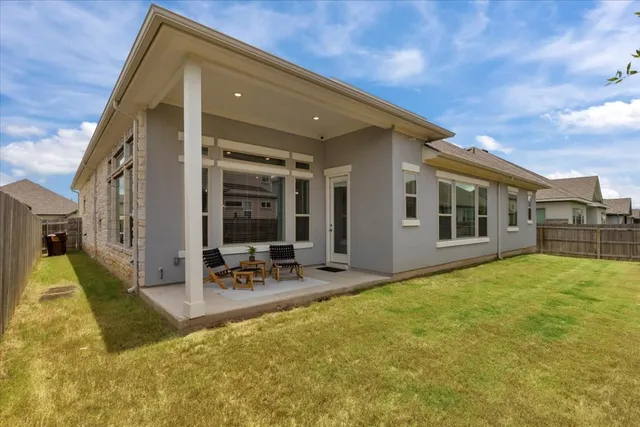 a view of swimming pool with patio