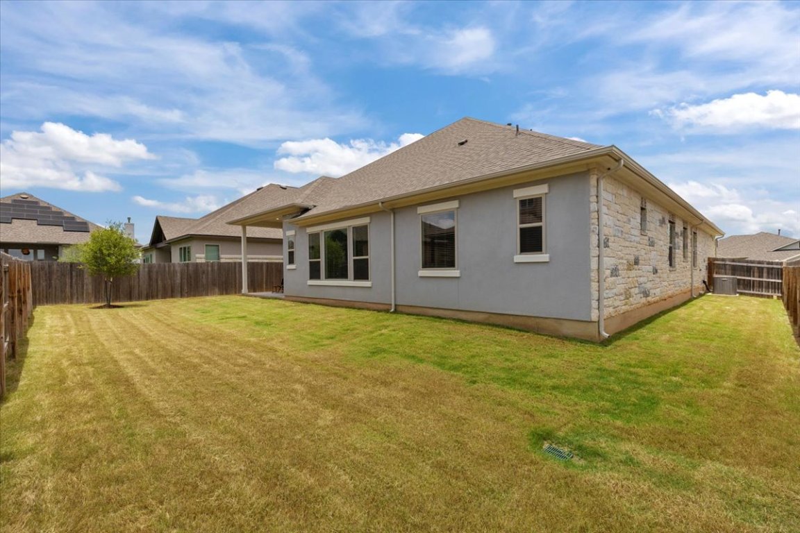 271 Eclipse Drive, Unit 67 Austin, TX 78737 - Photo 31 of 39 a front view of house with yard