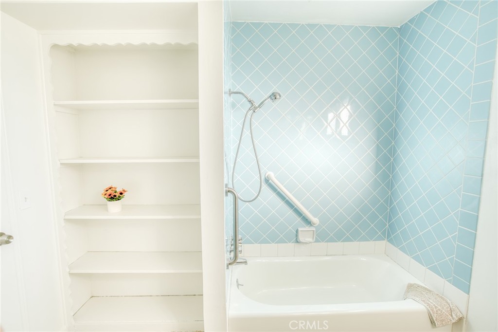 740 Walnut Lane Santa Barbara, CA 93111 - Photo 11 of 28 a bathroom with a bathtub and a shower