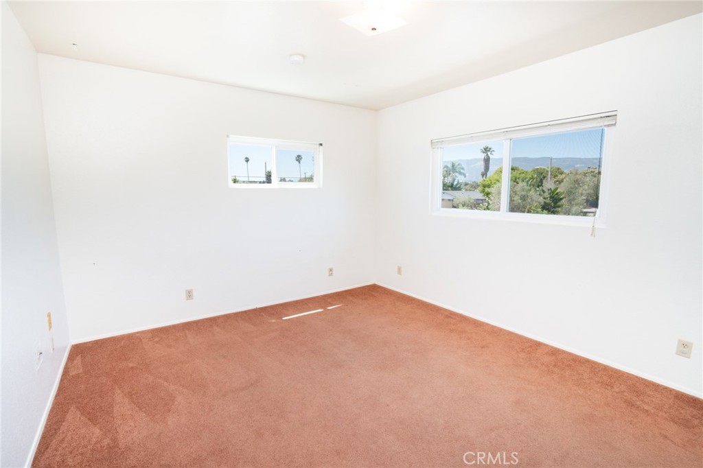 740 Walnut Lane Santa Barbara, CA 93111 - Photo 27 of 28 an empty room with a painting on the wall