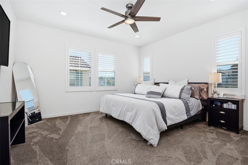 4130 Via Del Rey Oceanside, CA 92057 - Photo 13 of 35 a bed room with a bed and a window