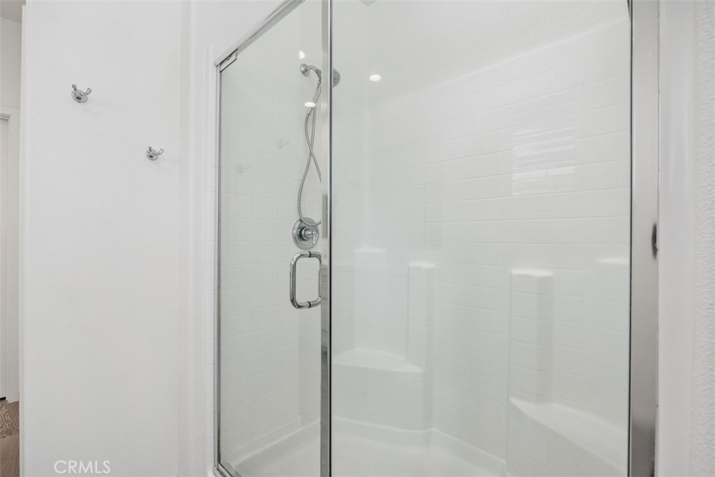 4130 Via Del Rey Oceanside, CA 92057 - Photo 15 of 35 a bathroom with a glass shower door