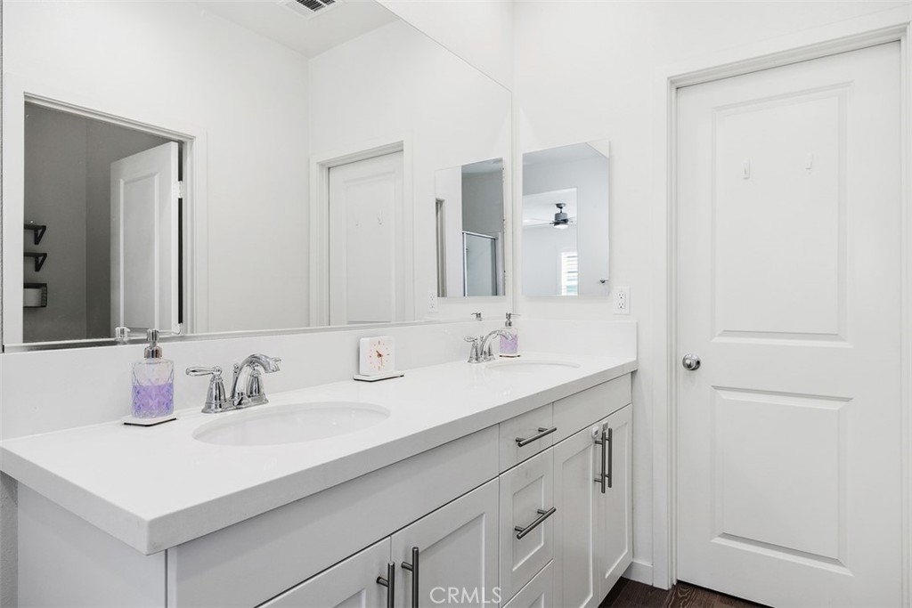4130 Via Del Rey Oceanside, CA 92057 - Photo 16 of 35 a bathroom with a sink and a mirror