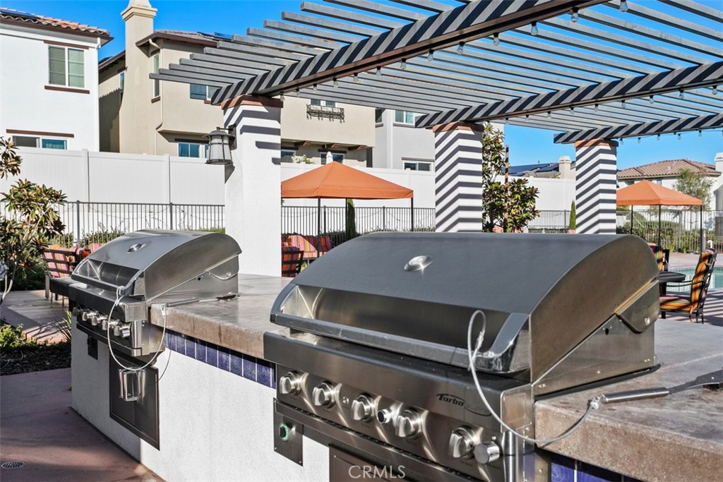 4130 Via Del Rey Oceanside, CA 92057 - Photo 29 of 35 a table and chairs in a room
