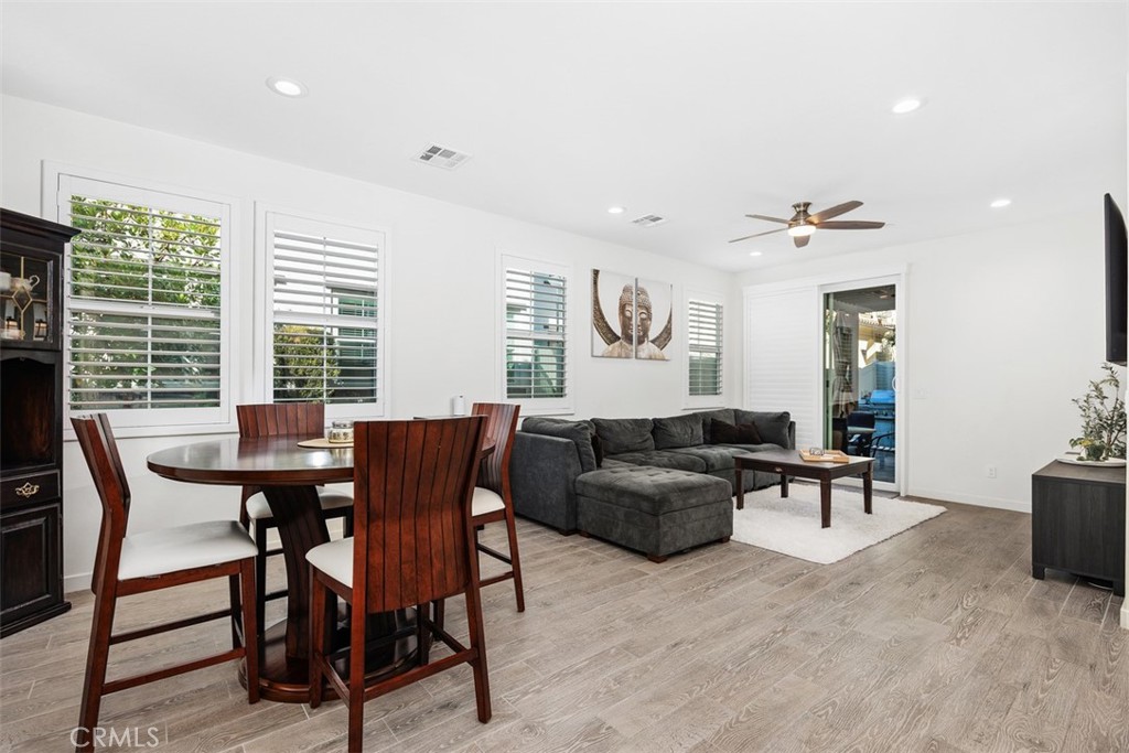 4130 Via Del Rey Oceanside, CA 92057 - Photo 3 of 35 a living room with furniture a large window and a table
