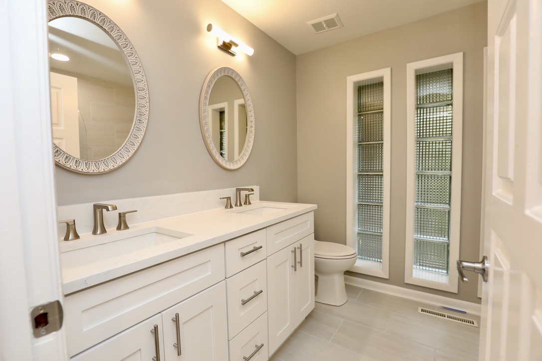 4 Kings Turn Bourbonnais, IL 60914 - Photo 8 of 28 a bathroom with a double vanity sink mirror and toilet