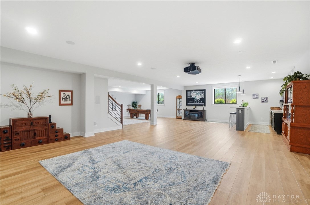 1247 Normandy Rue Dayton, OH 45458 - Photo 45 of 76 This expansive recreation room features recessed lighting and durable hardwood flooring.