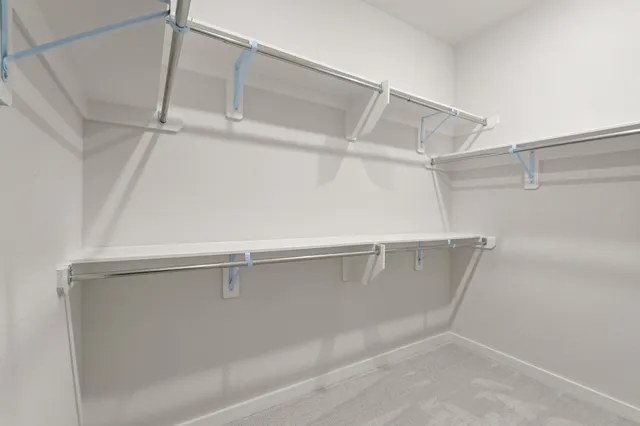 a view of empty room with windows