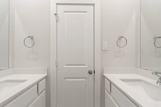 a bath room with a toilet and a bath tub