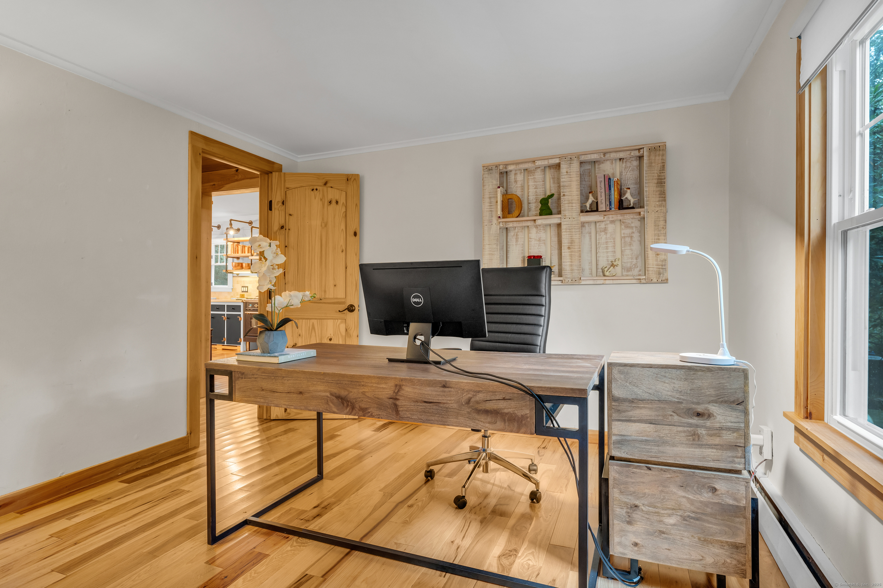735 Opening Hill Road Madison, CT 06443 - Photo 15 of 39 a living room with furniture and a flat screen tv