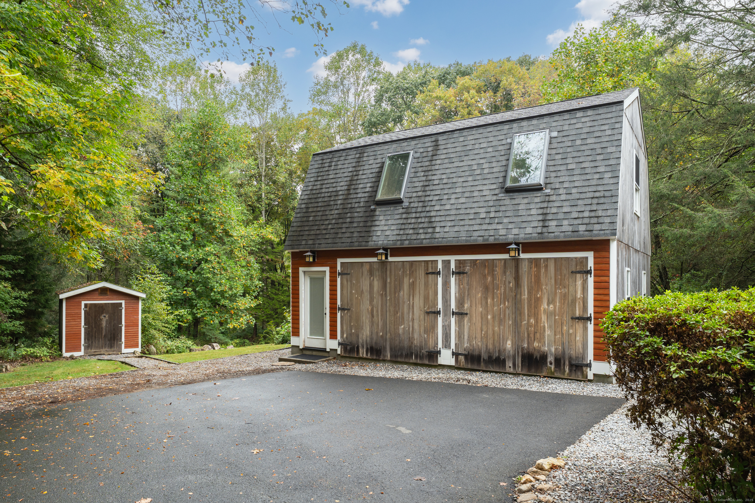 735 Opening Hill Road Madison, CT 06443 - Photo 26 of 39 a view of a house with a yard and garage