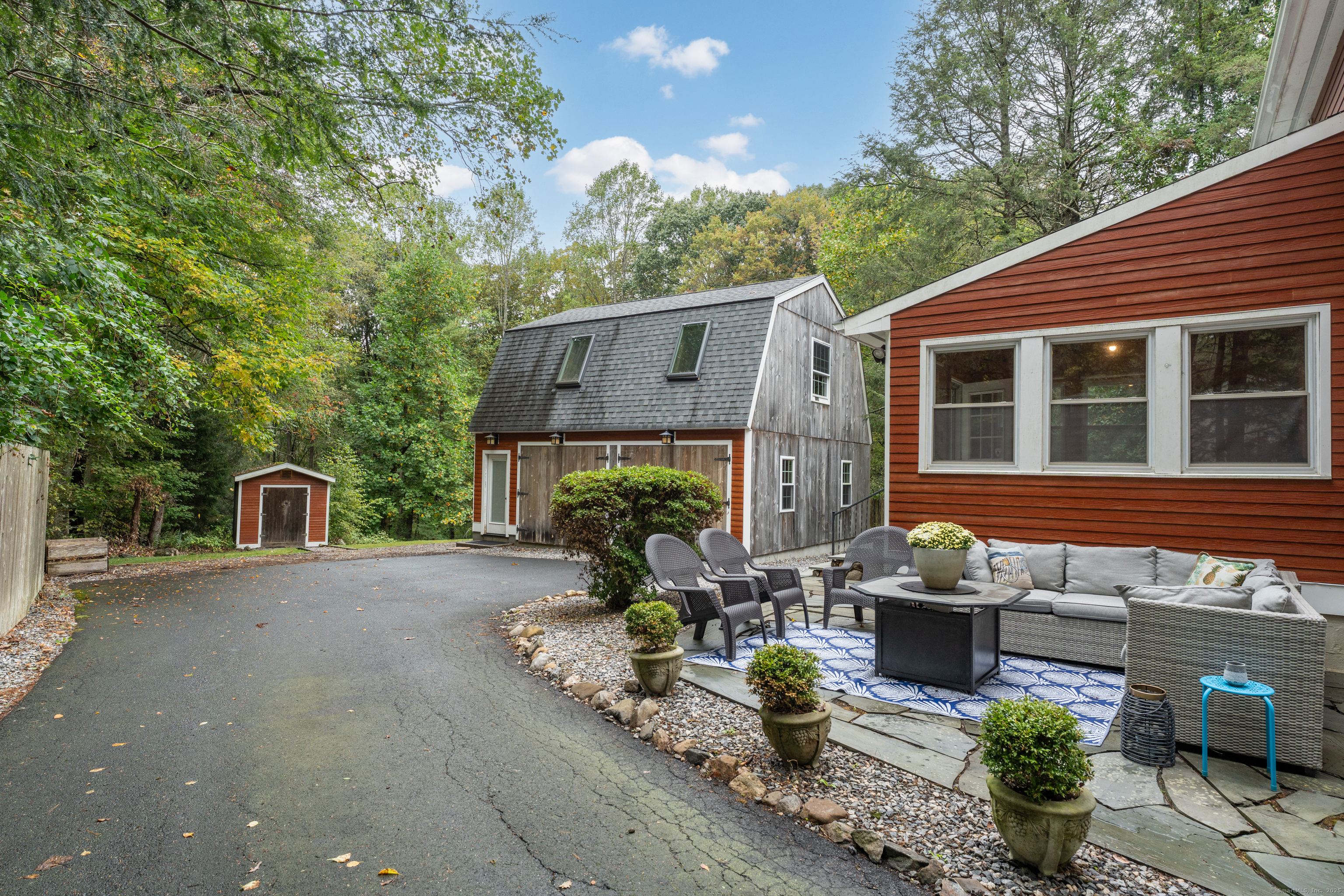 735 Opening Hill Road Madison, CT 06443 - Photo 31 of 39 a front view of a house with garden