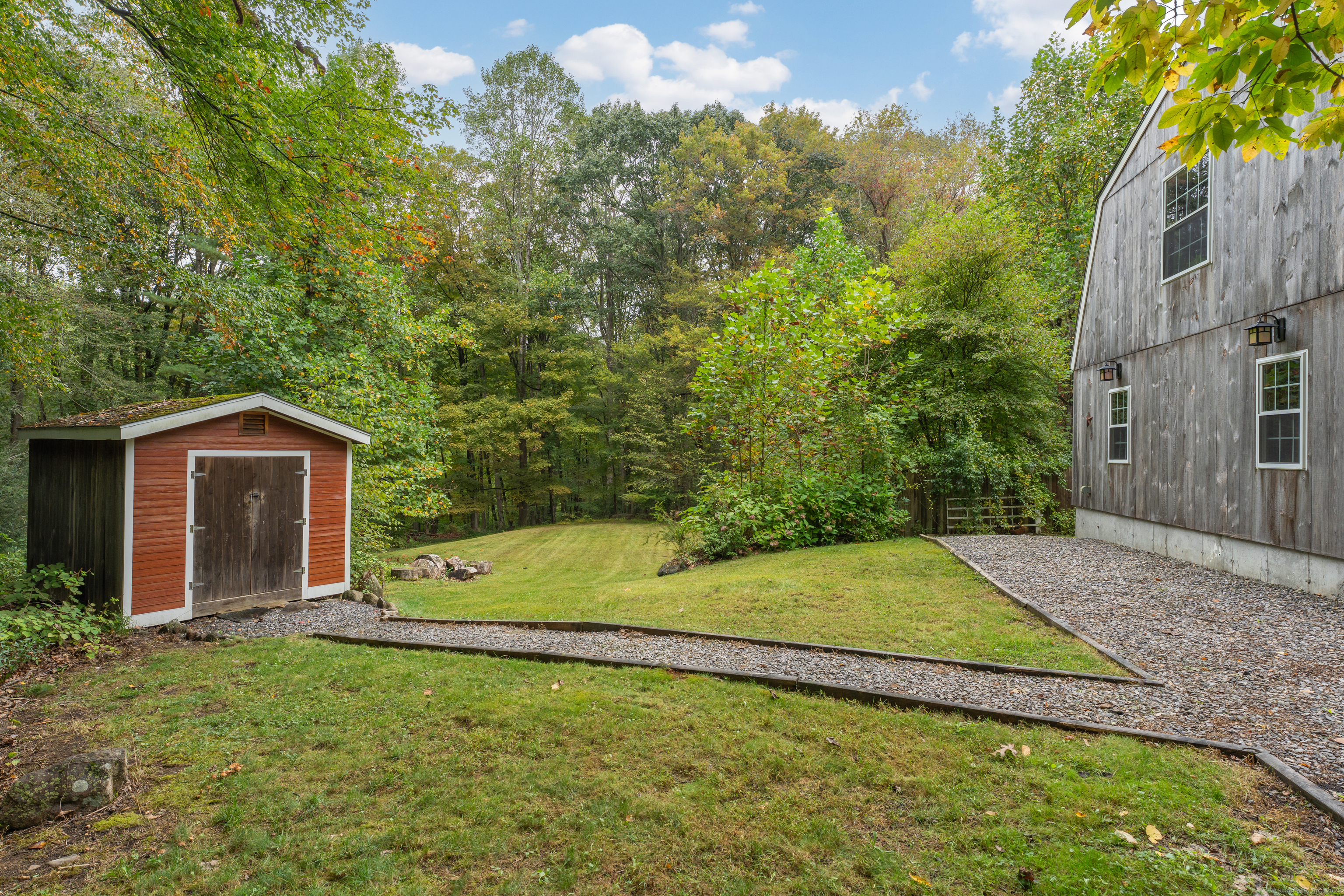 735 Opening Hill Road Madison, CT 06443 - Photo 35 of 39 a pathway of a house with a yard