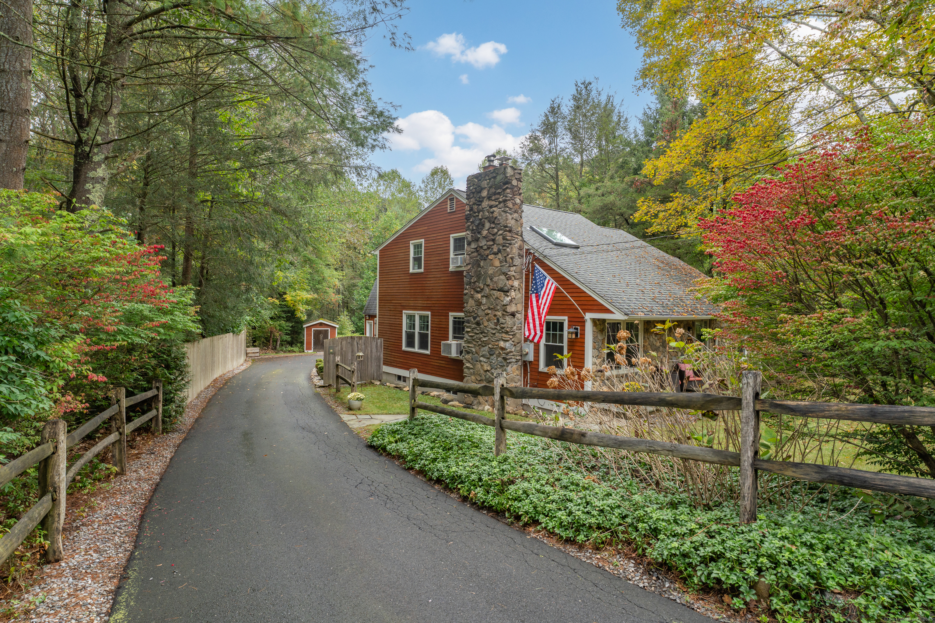 735 Opening Hill Road Madison, CT 06443 - Photo 36 of 39 a front view of a house with a yard