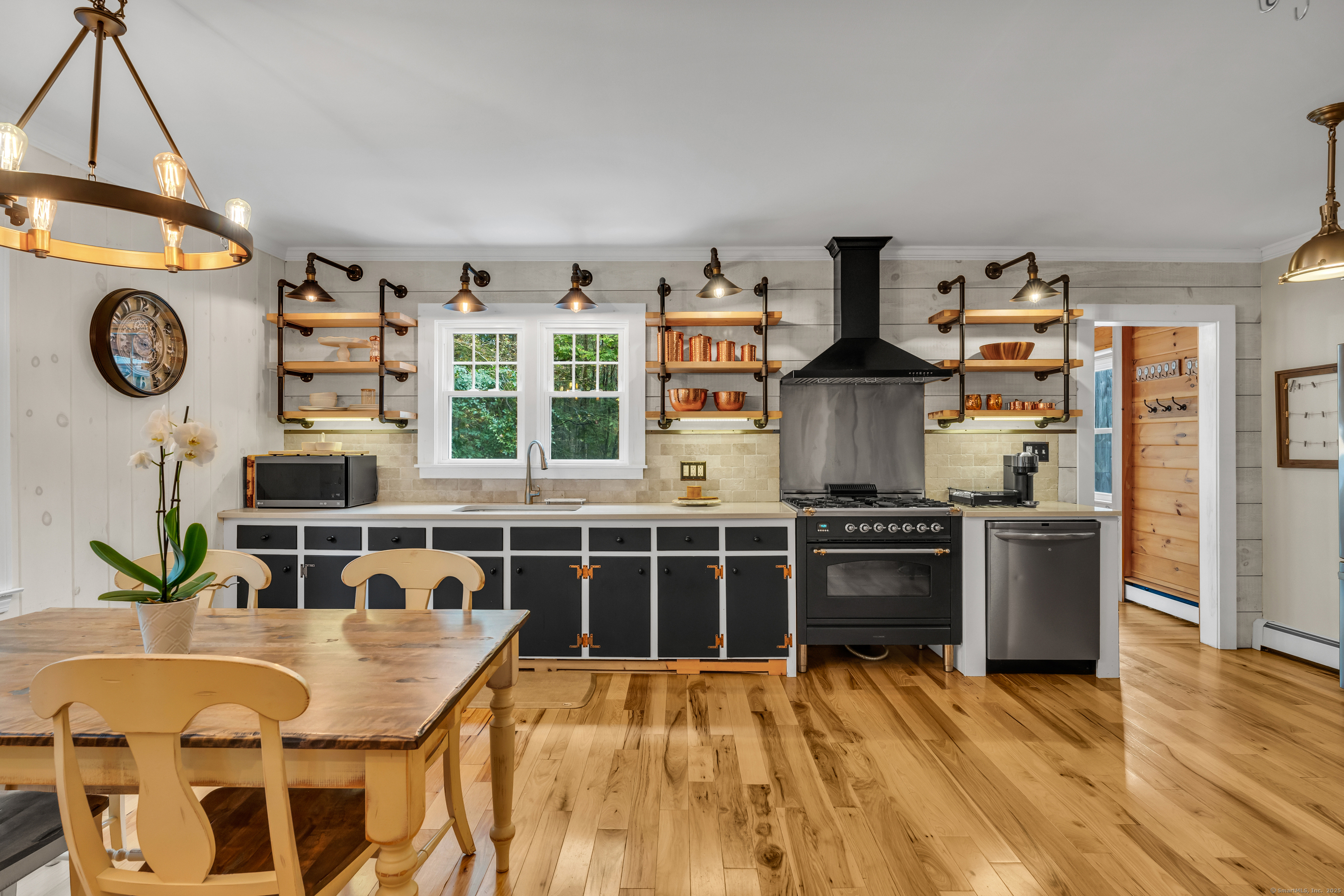 735 Opening Hill Road Madison, CT 06443 - Photo 5 of 39 a kitchen with stainless steel appliances granite countertop a stove and a wooden floors