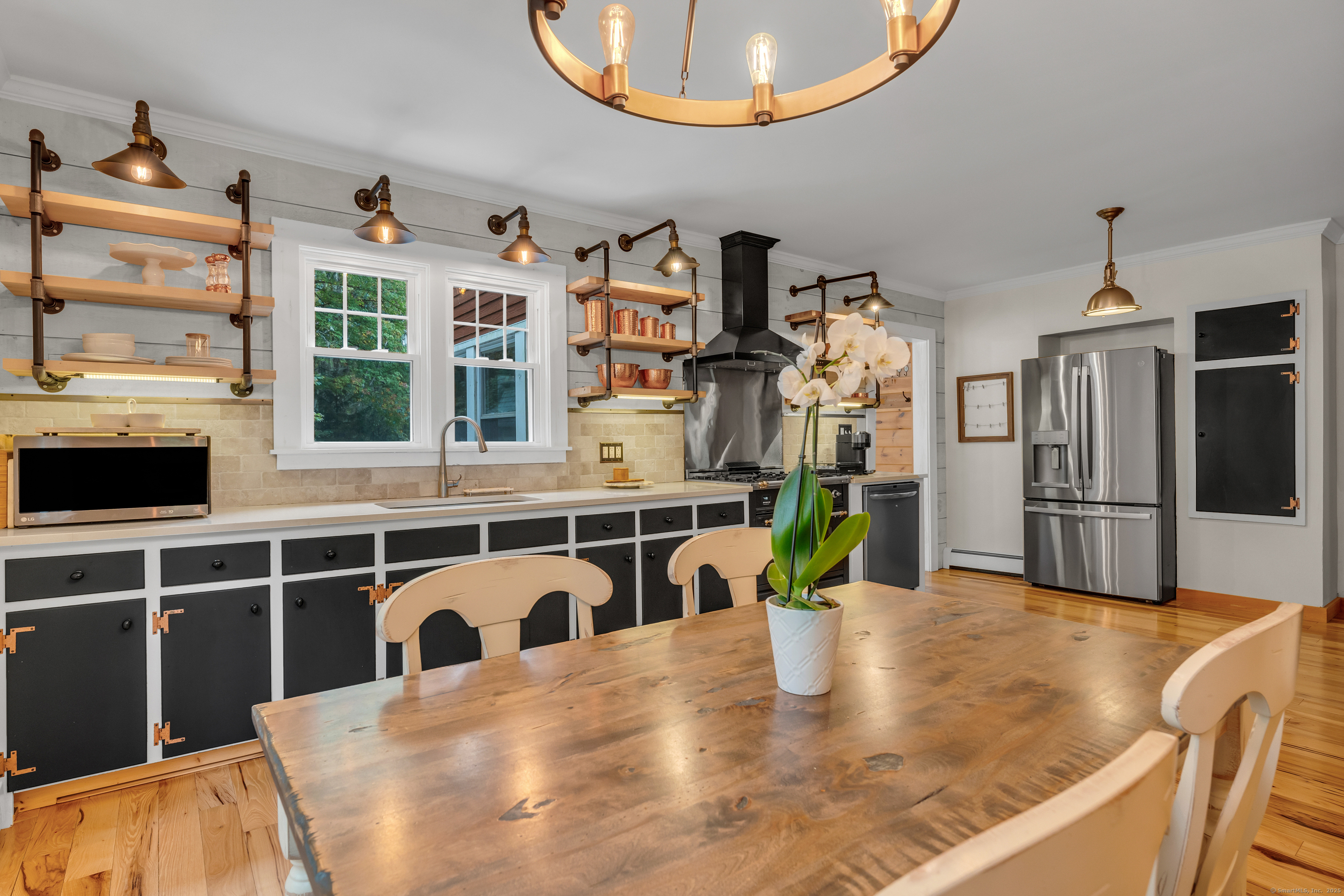 735 Opening Hill Road Madison, CT 06443 - Photo 6 of 39 a view of a living room and kitchen