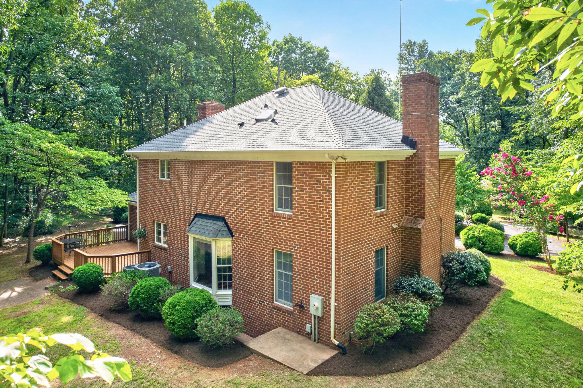 7501 Moormont Road Rapidan, VA 22733 - Photo 5 of 76 Charming brick home in lush greenery.