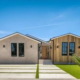 a front view of a house with a porch