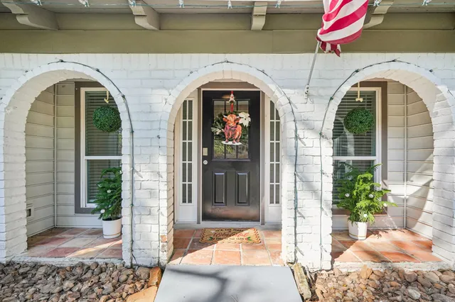 a view of a entryway door of the house