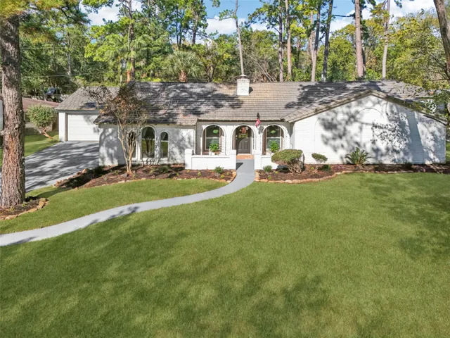 a front view of building with yard