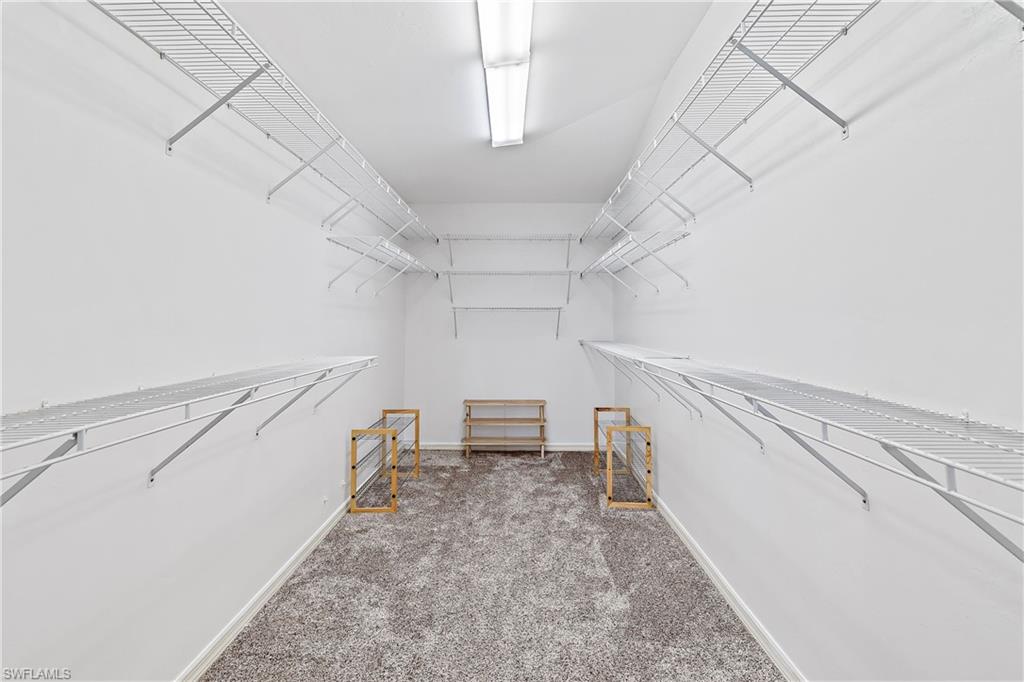 740 Orchid Drive Naples, FL 34102 - Photo 18 of 33 a view of entryway and kitchen