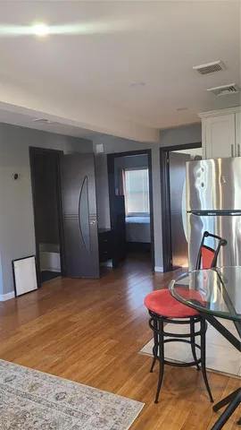 a room with furniture pool table and rug