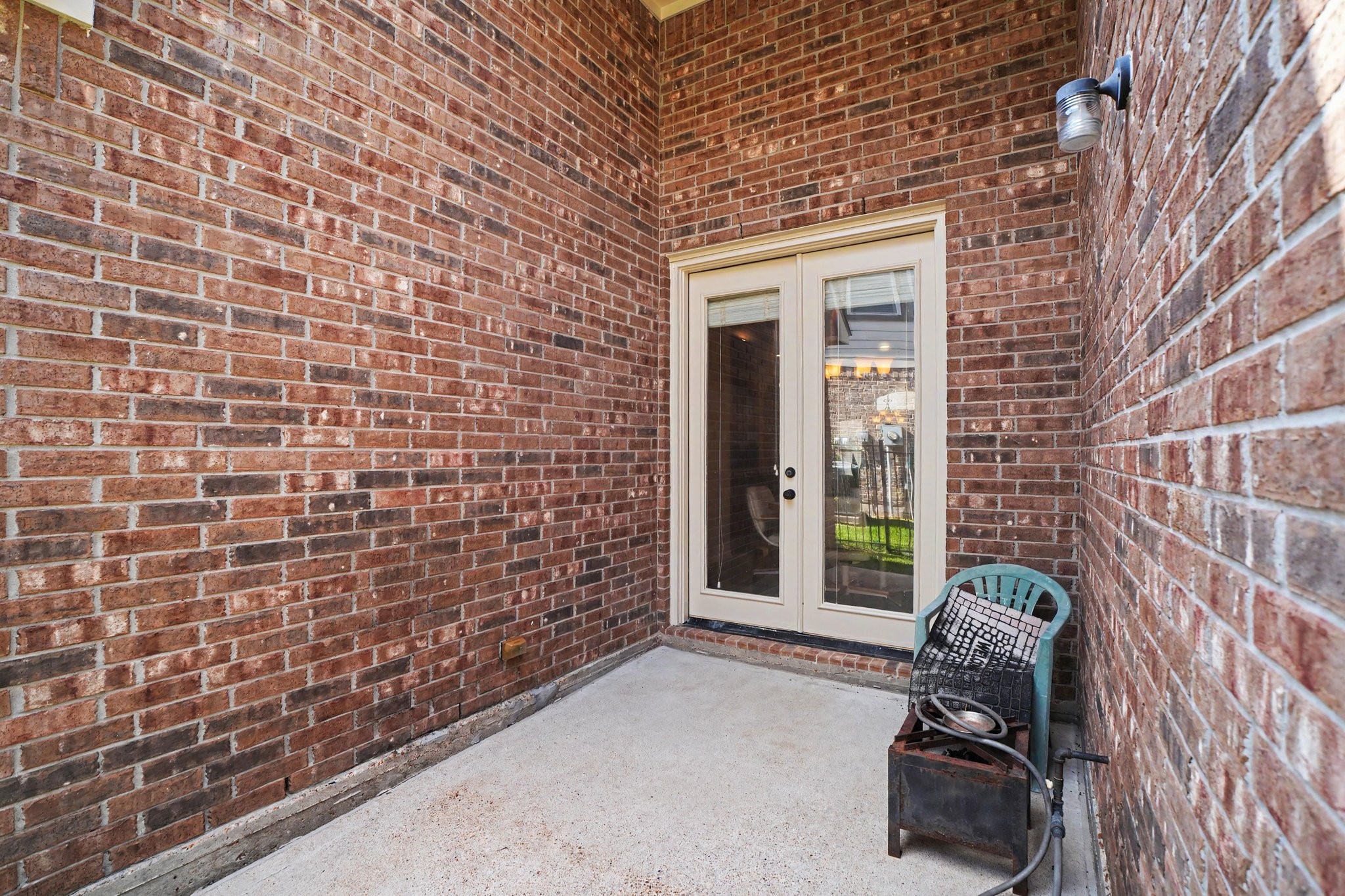 62 Sandwell Place Spring, TX 77389 - Photo 43 of 50 This side patio off the kitchen is plumbed with natual gas.