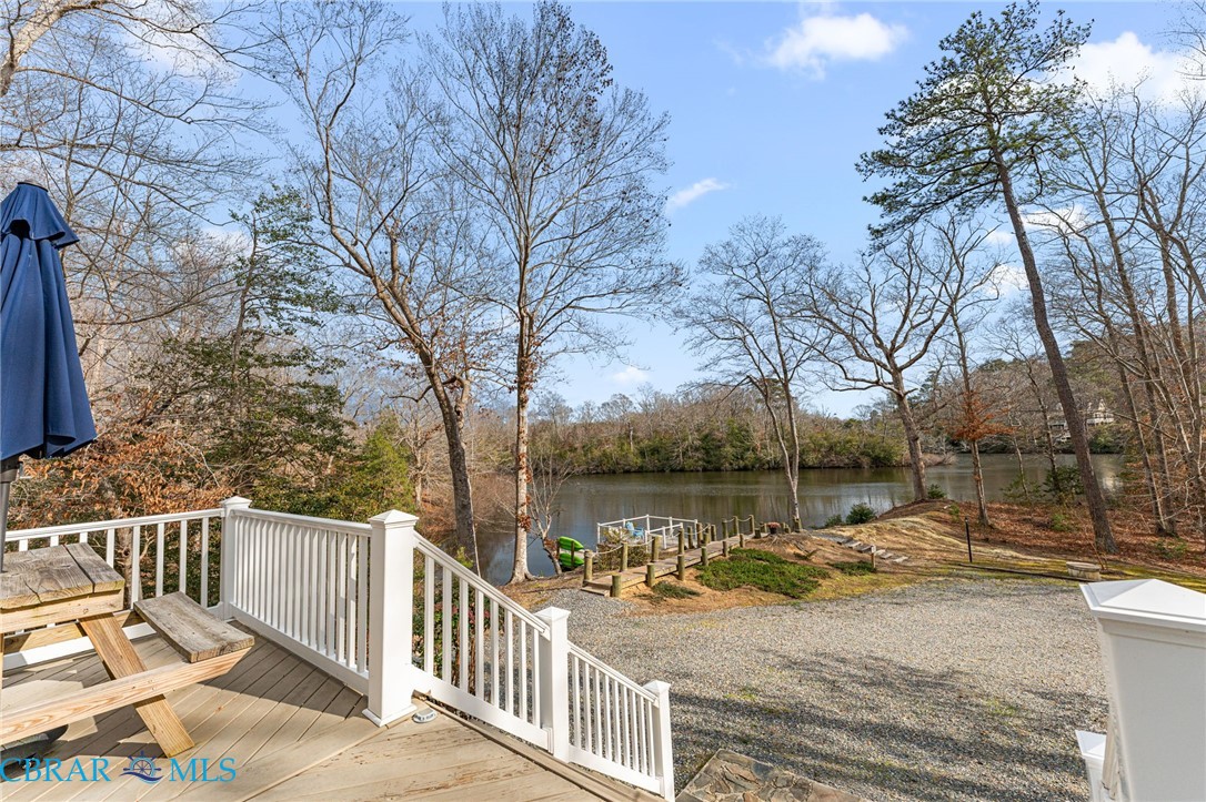 4775 Stormont Road Hartfield, VA 23071 - Photo 17 of 45 Deck featuring a water view