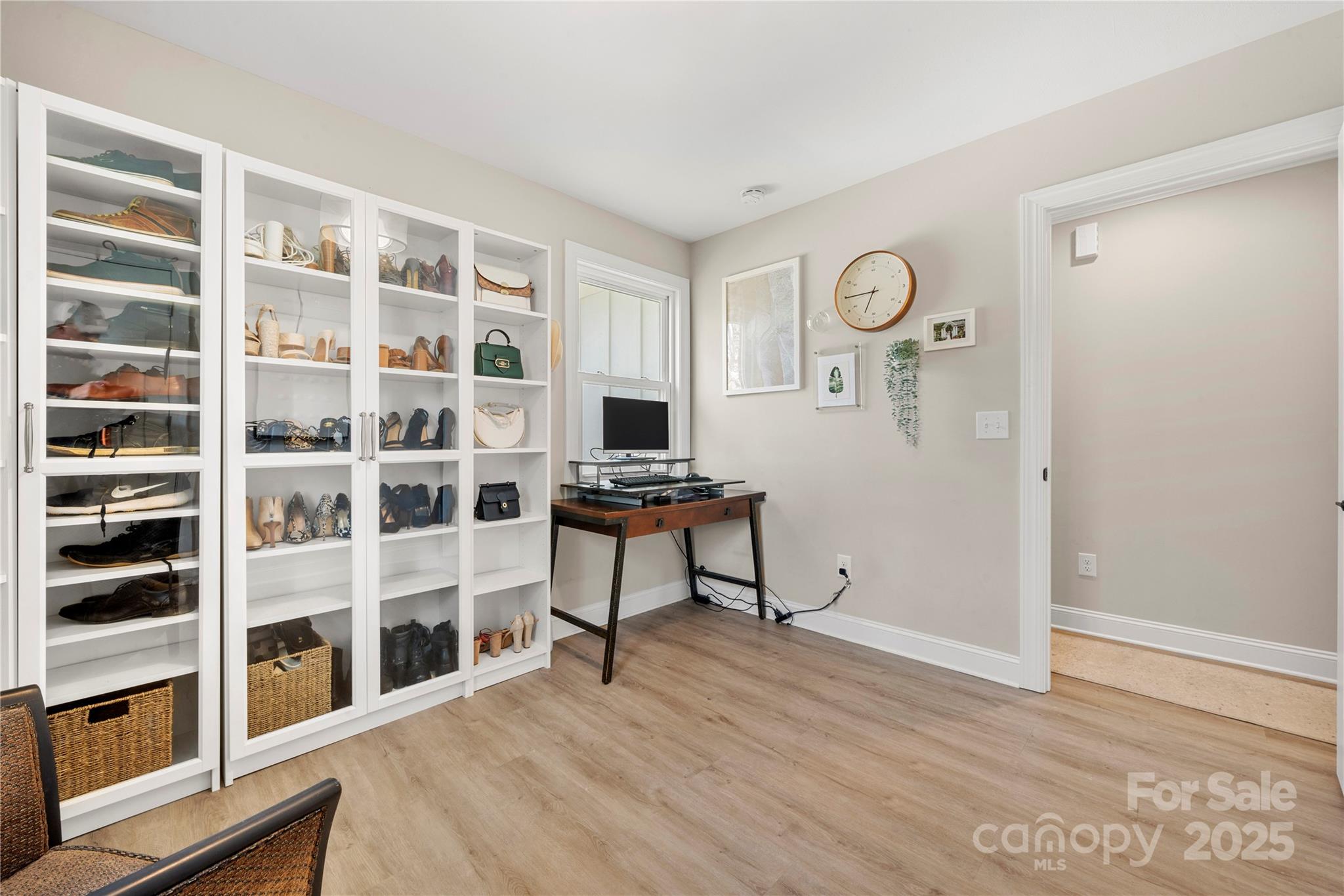 4820 Valley Stream Road Charlotte, NC 28209 - Photo 29 of 37 a view of a livingroom with furniture and wooden floor