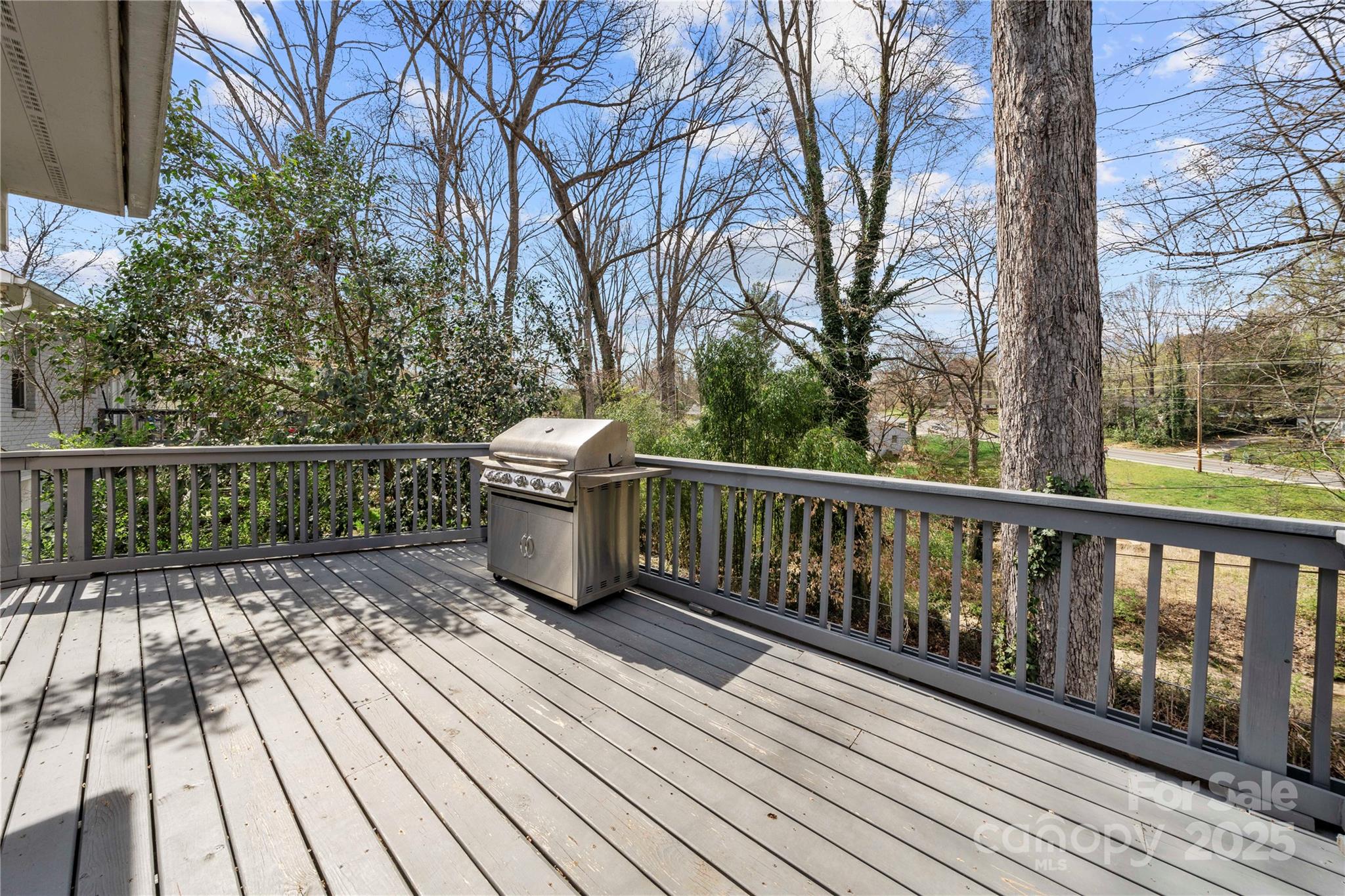 4820 Valley Stream Road Charlotte, NC 28209 - Photo 30 of 37 a view of wooden deck with a patio
