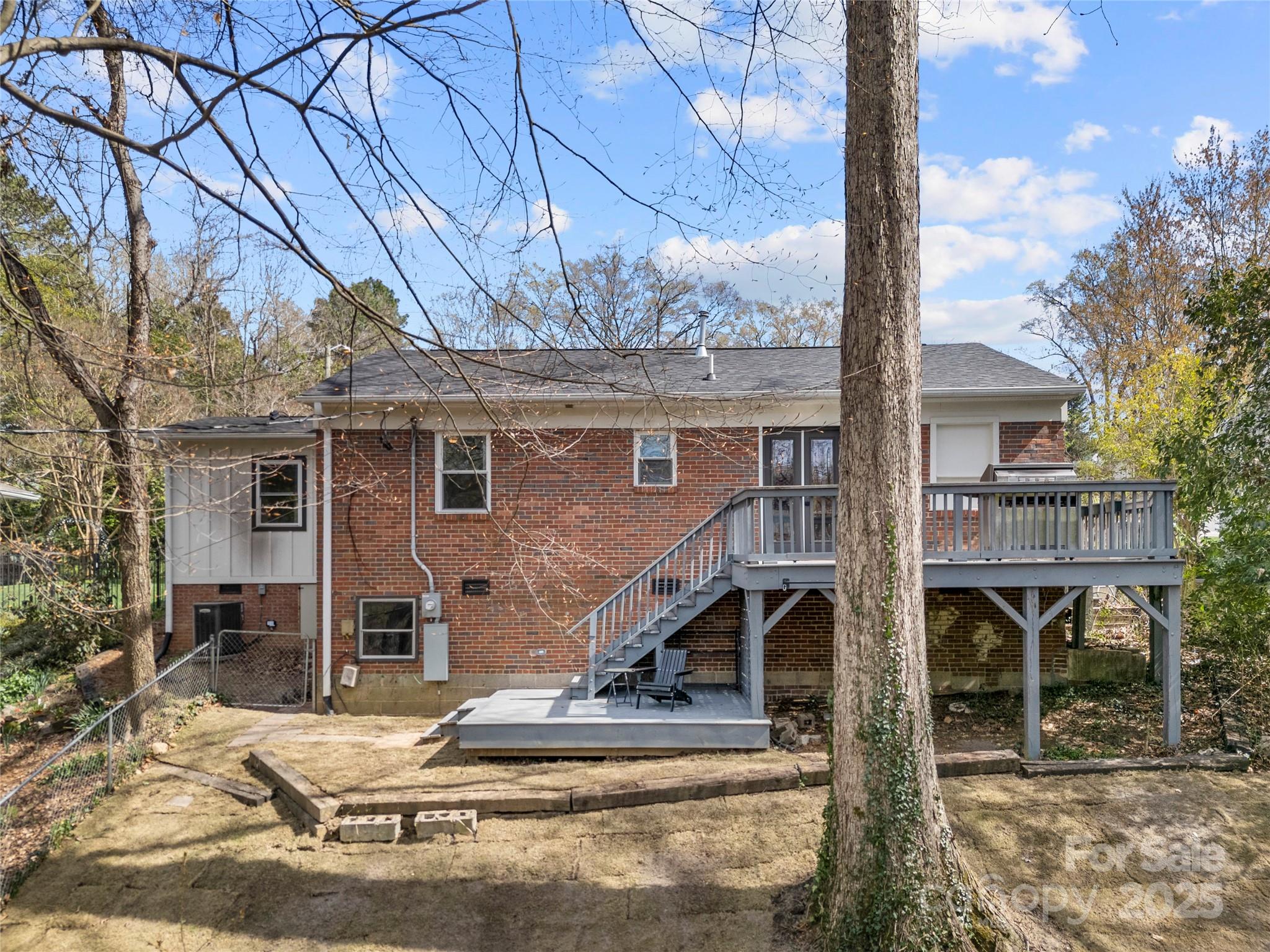4820 Valley Stream Road Charlotte, NC 28209 - Photo 34 of 37 a front view of a house with garden