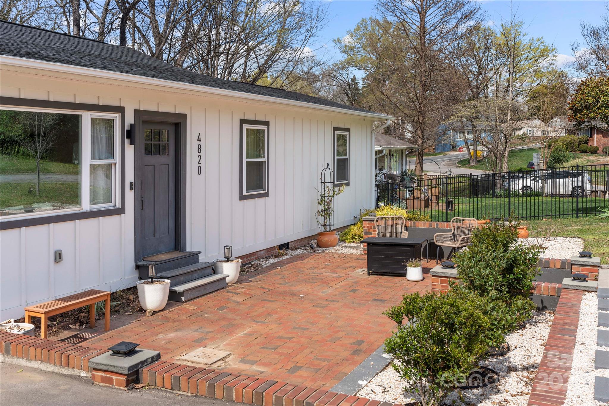 4820 Valley Stream Road Charlotte, NC 28209 - Photo 36 of 37 a front view of a house with garden