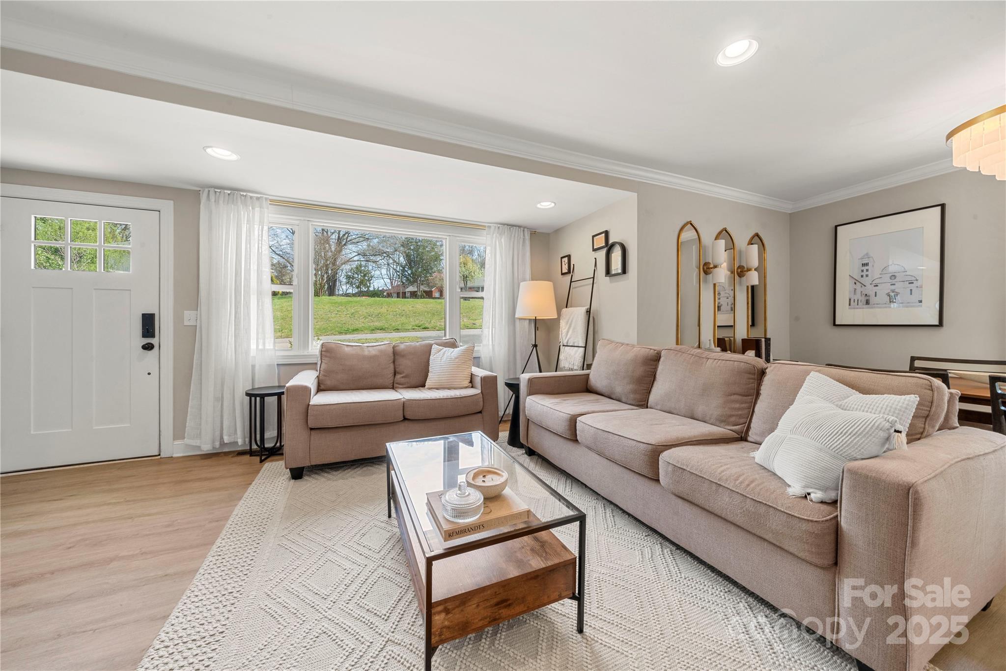 4820 Valley Stream Road Charlotte, NC 28209 - Photo 6 of 37 a living room with furniture and a large window
