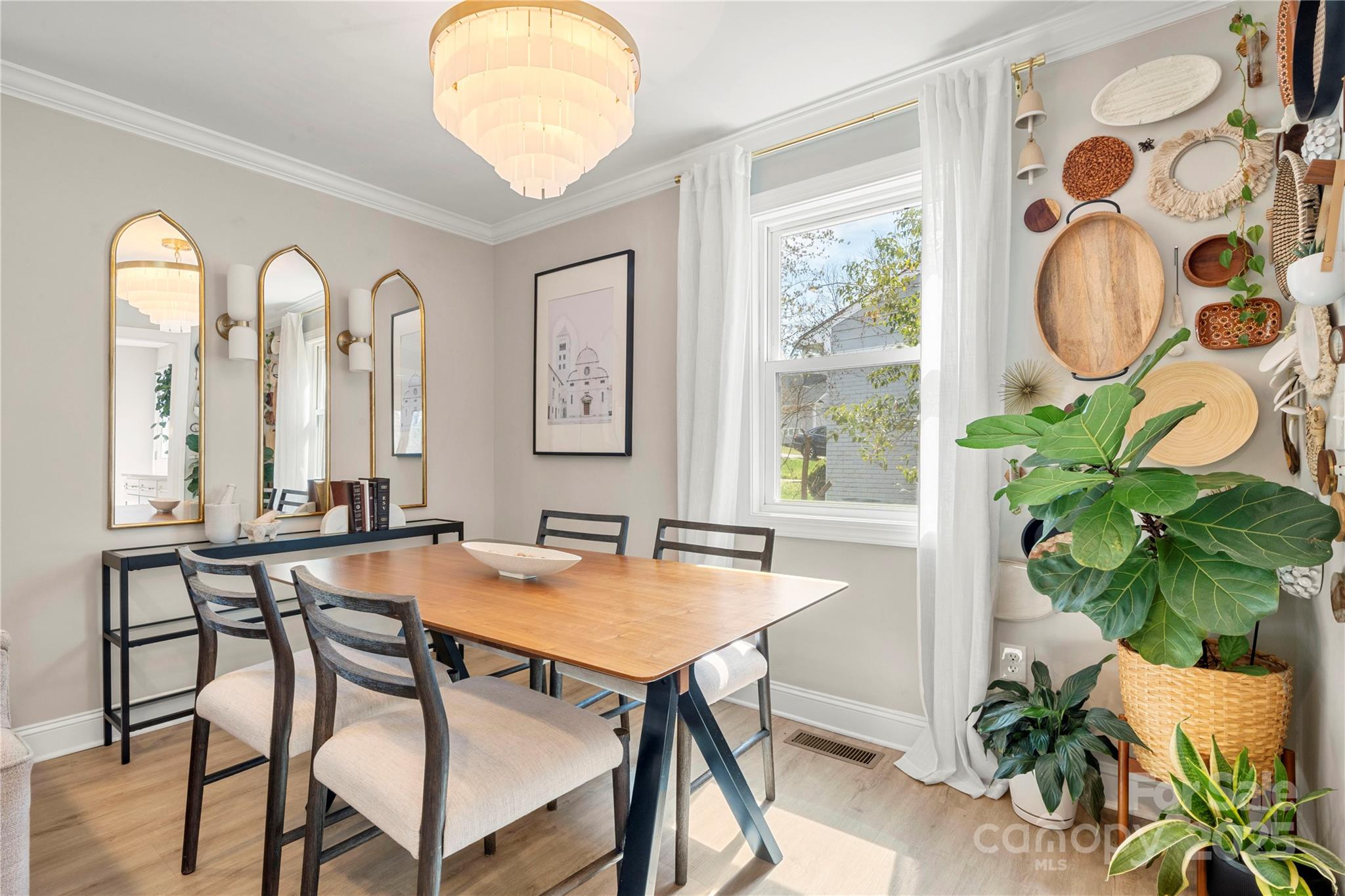 4820 Valley Stream Road Charlotte, NC 28209 - Photo 7 of 37 a view of a dining room with furniture window and wooden floor