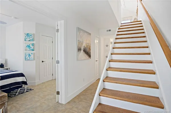 a view of an entryway with staircase