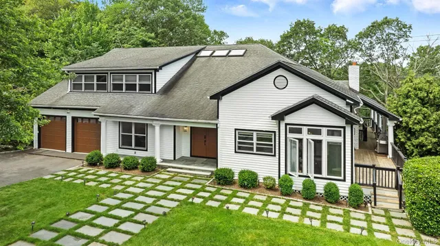 a house view with a garden space