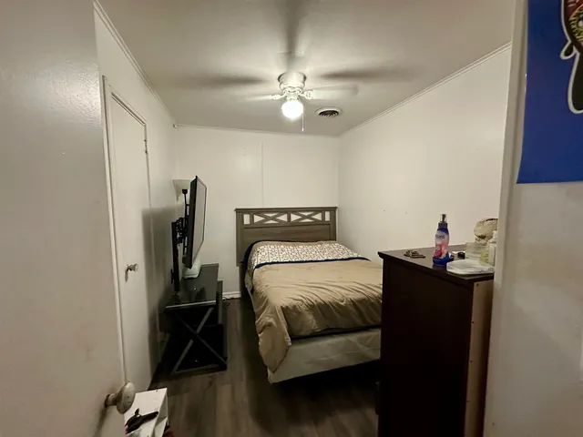 a bathroom with a toilet a sink and a shower