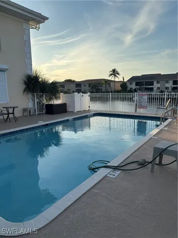 a view of a house with a yard and plants