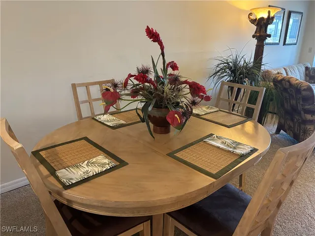 a view of a workspace with furniture