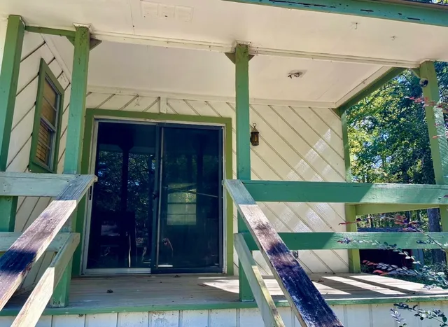 a view of yard with swimming pool