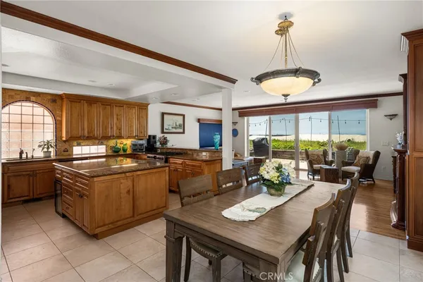 a very nice looking dining room with a table and chairs