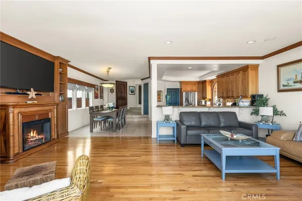 a view of an outdoor kitchen with seating area