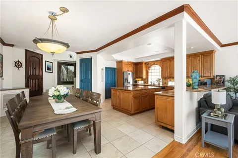 a front view of a building with a garden