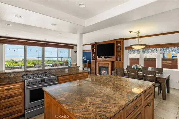 a view of a hallway to a livingroom with furniture