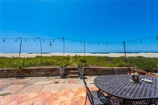 a view of entryway livingroom and hall with wooden floor