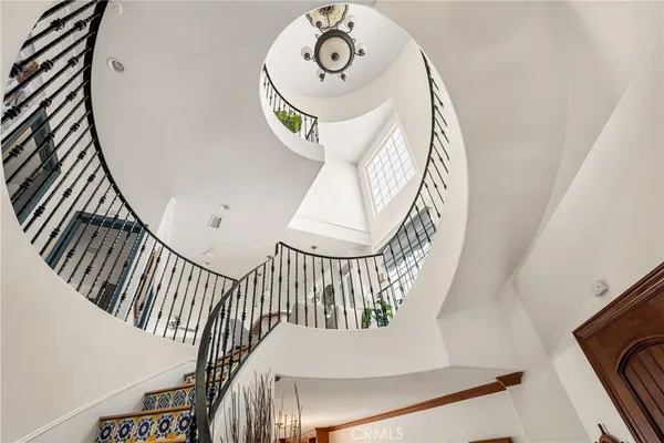 a living room with furniture fireplace and a flat screen tv
